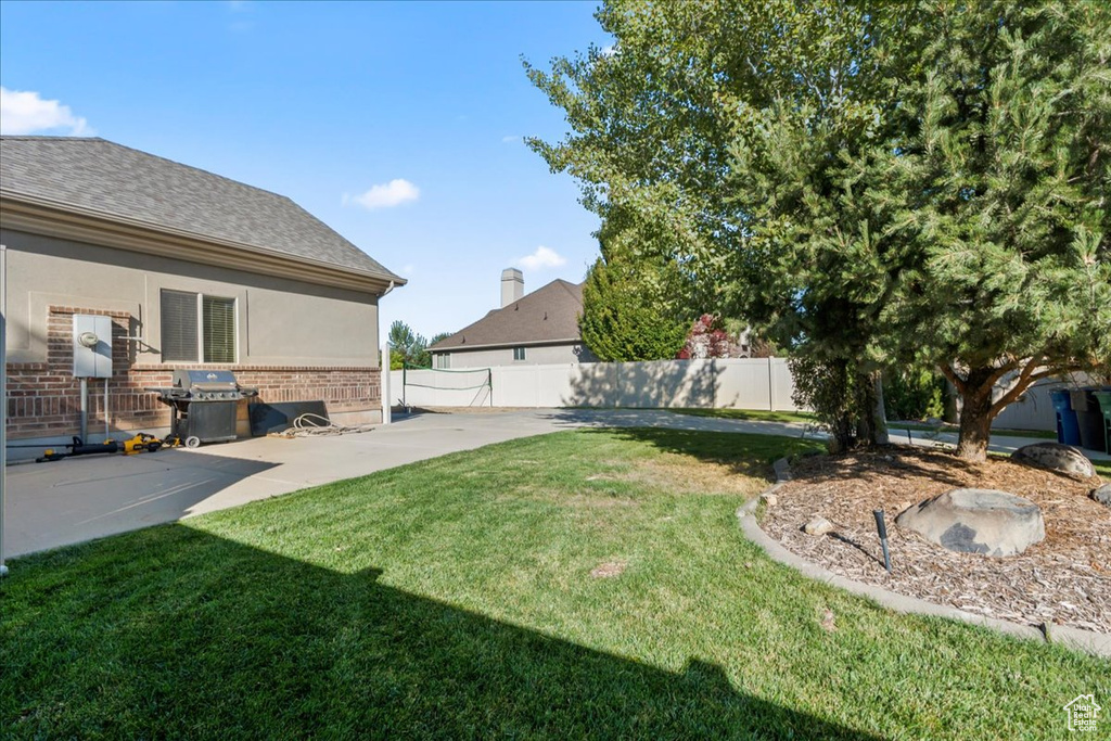 View of yard featuring a patio area