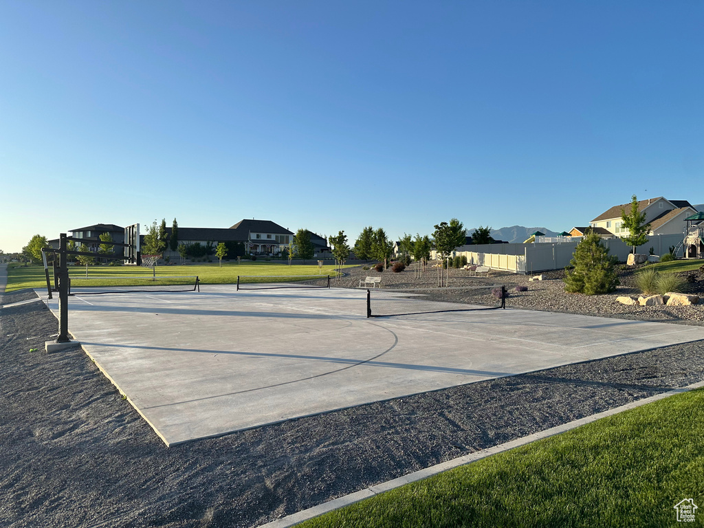 View of sport court with community basketball court and a residential view