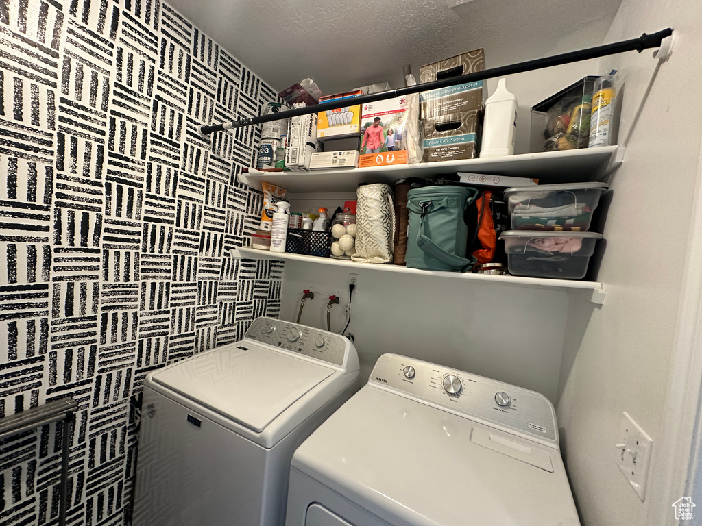 Laundry room featuring washing machine and dryer