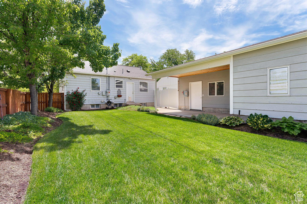 Rear view of house with a patio