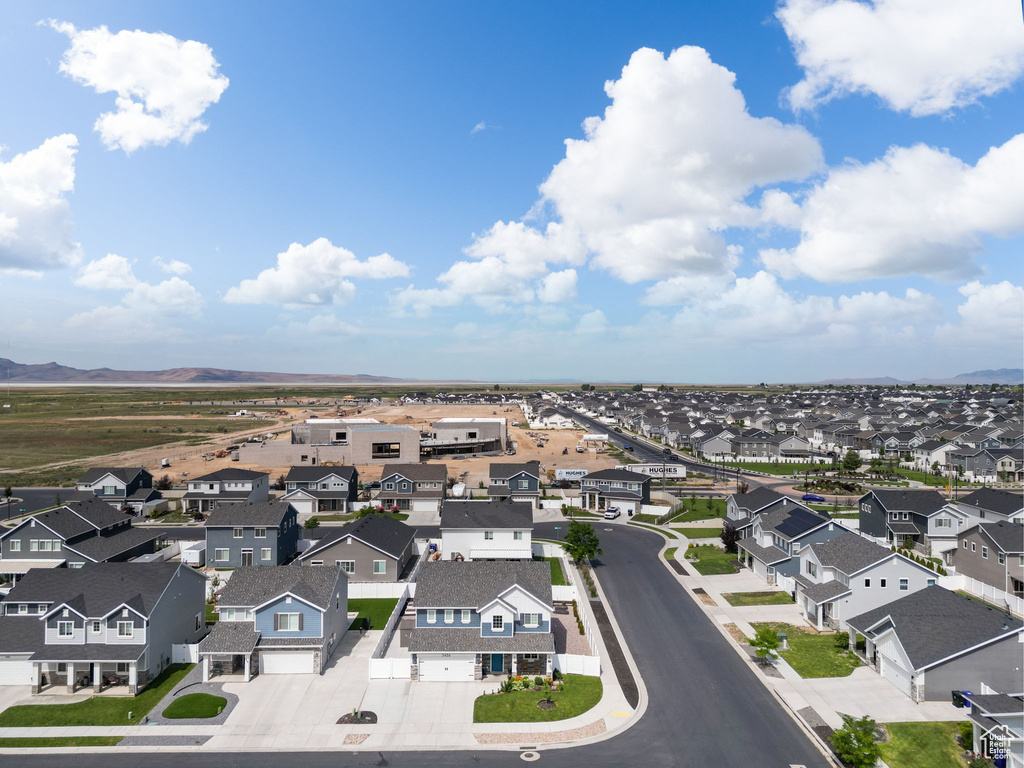 Aerial view of residential area with a mountainous background