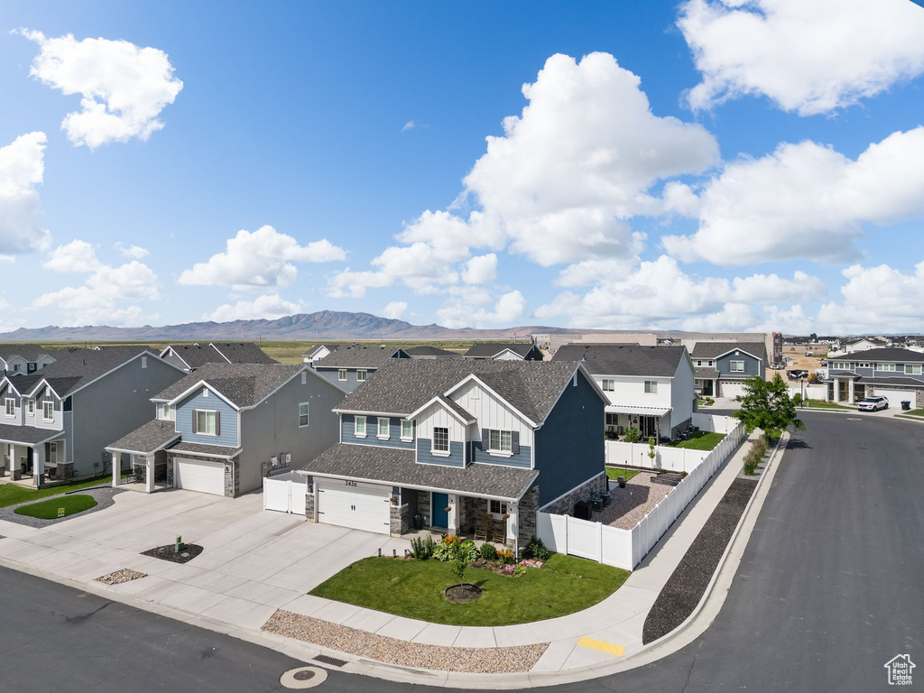 Aerial view of residential area with a mountain backdrop