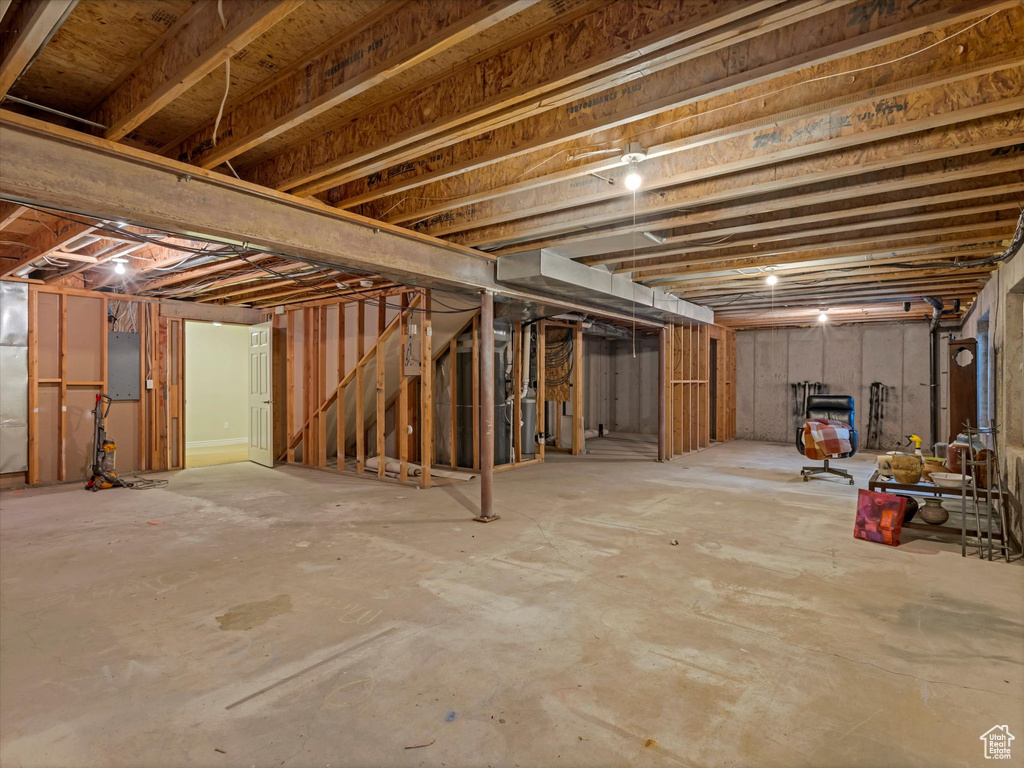 Unfinished below grade area with electric panel