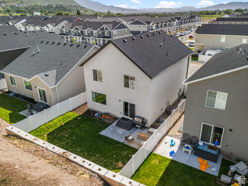 Aerial view of residential area with a mountain backdrop