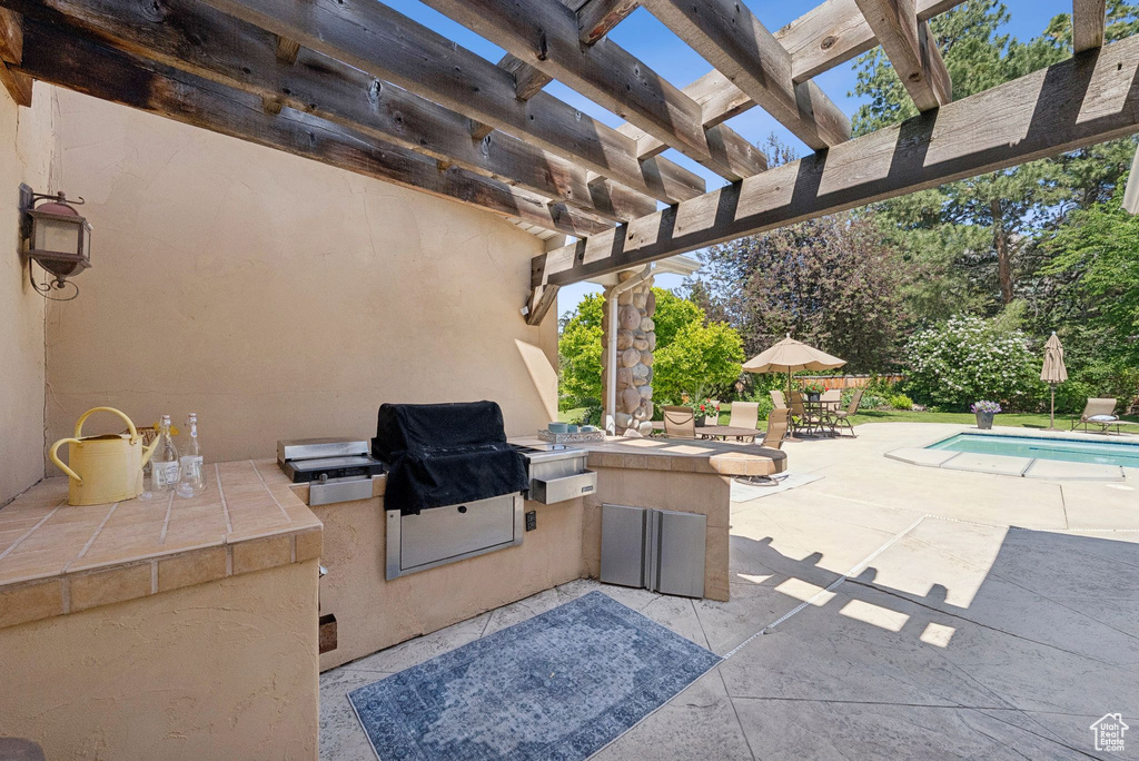 View of patio / terrace featuring a pergola