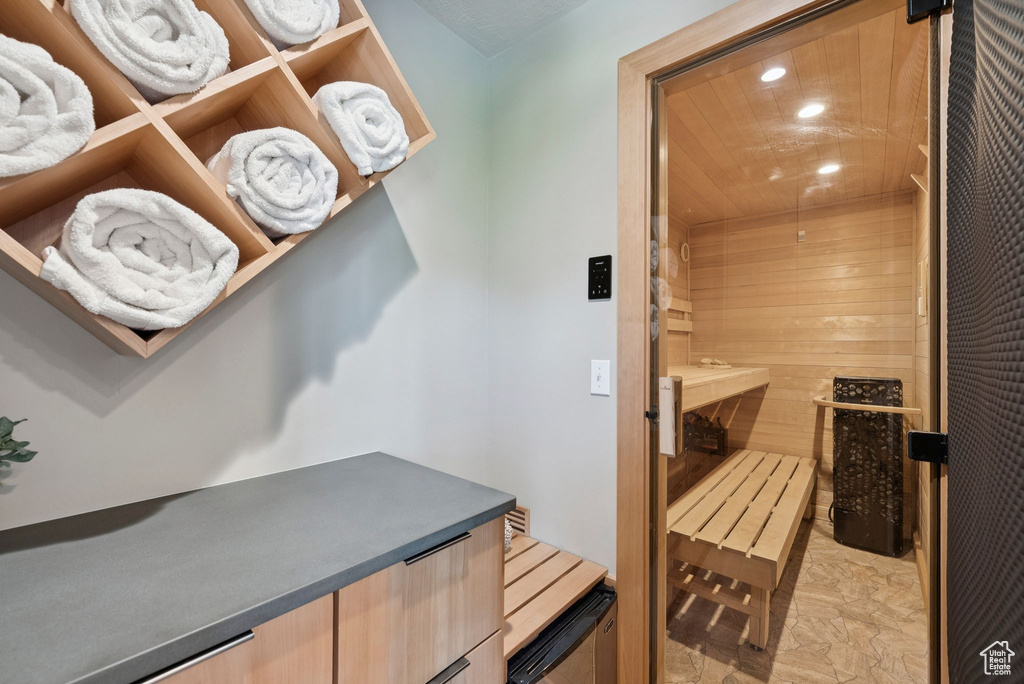 Sauna / steam room with recessed lighting