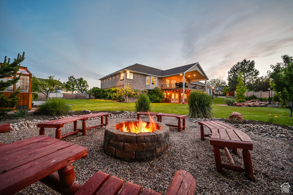 View of patio / terrace with a fire pit