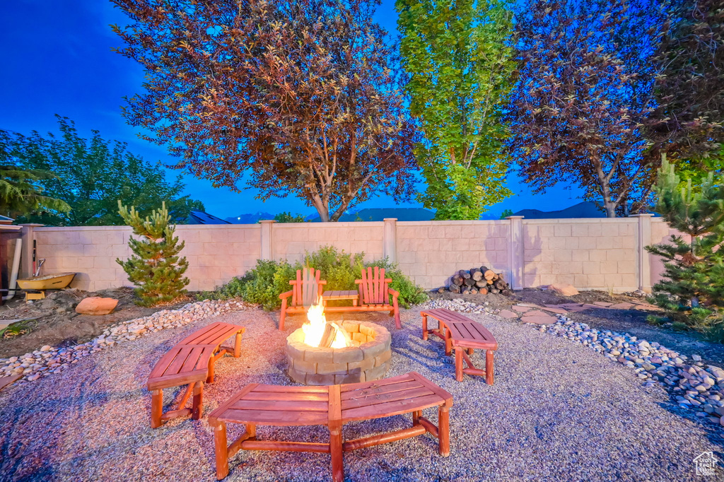 View of patio featuring a fire pit