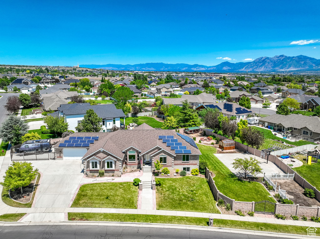 Aerial view of residential area with a mountainous background
