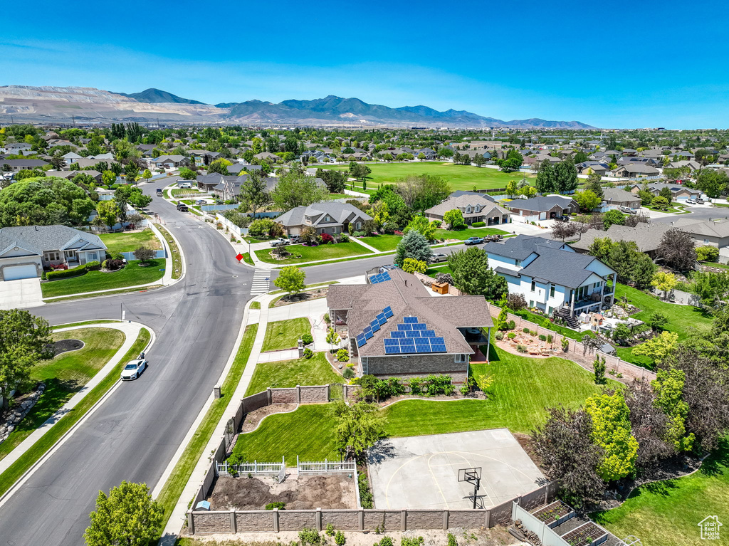 Aerial view of residential area with a mountain backdrop