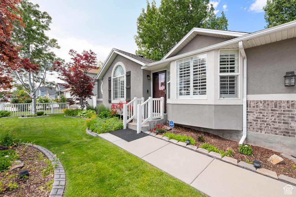 View of front of home featuring stucco siding