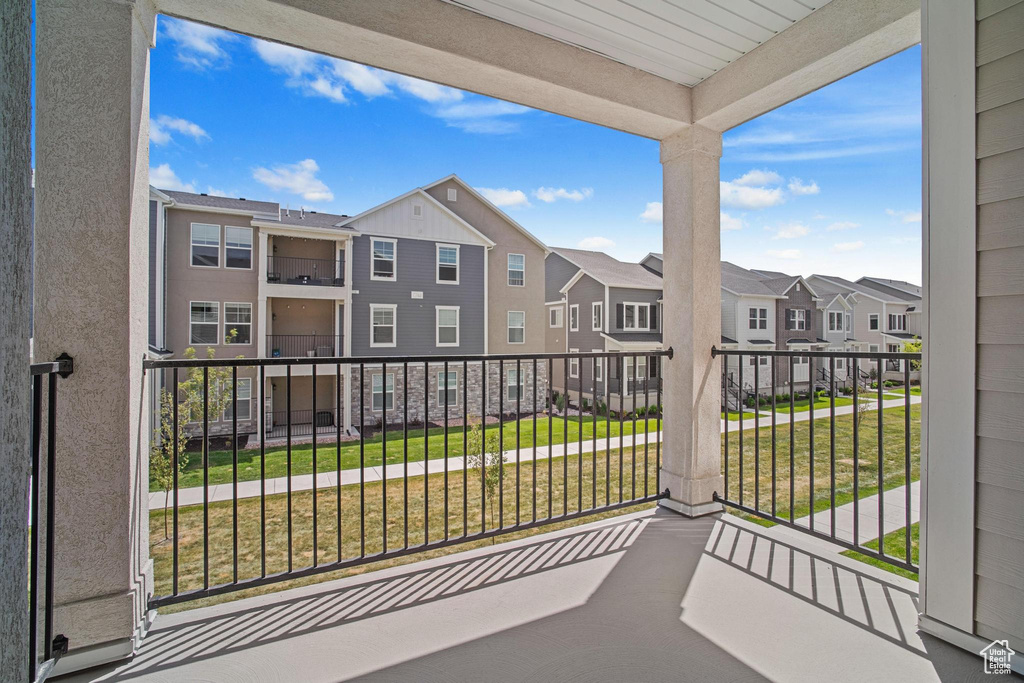 Balcony featuring a residential view