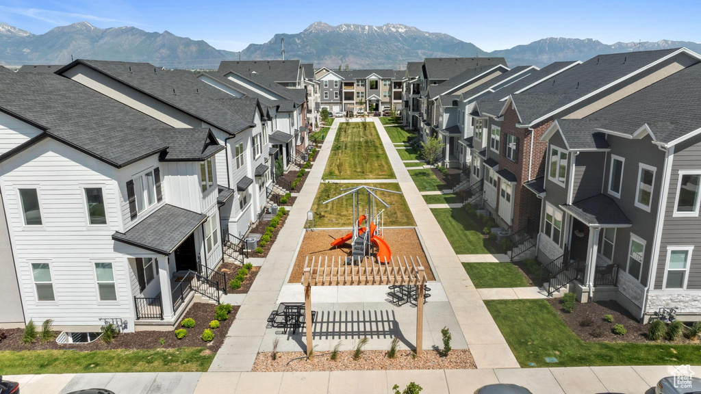 Aerial view of residential area featuring mountains