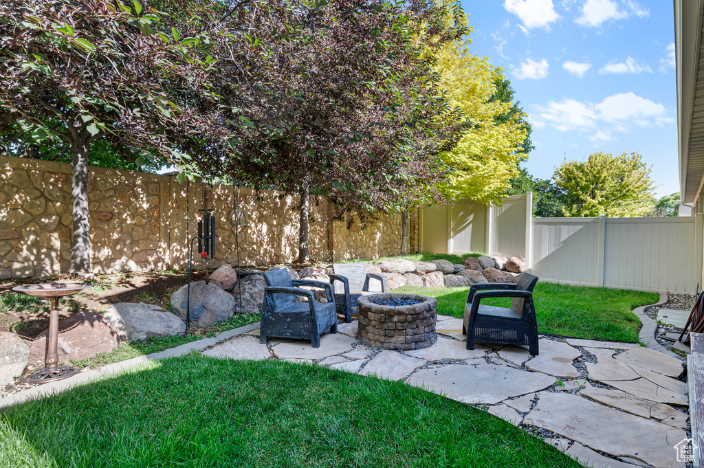 View of patio / terrace featuring a fire pit