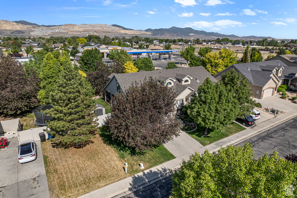 Aerial perspective of suburban area featuring mountains