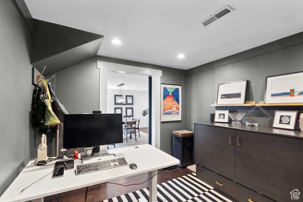 Office area featuring recessed lighting
