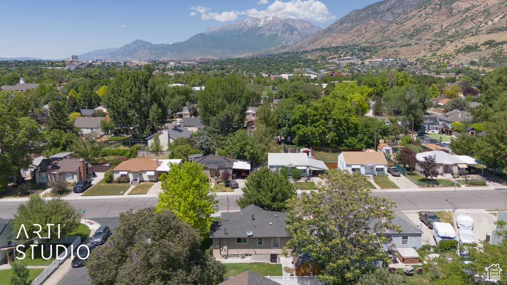 View of property location featuring nearby suburban area and a mountainous background