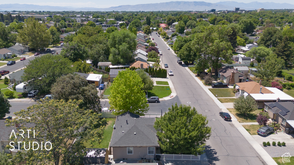 Aerial view of residential area featuring mountains