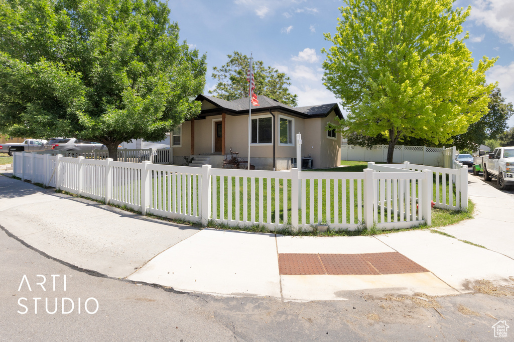 View of front of house with stucco siding
