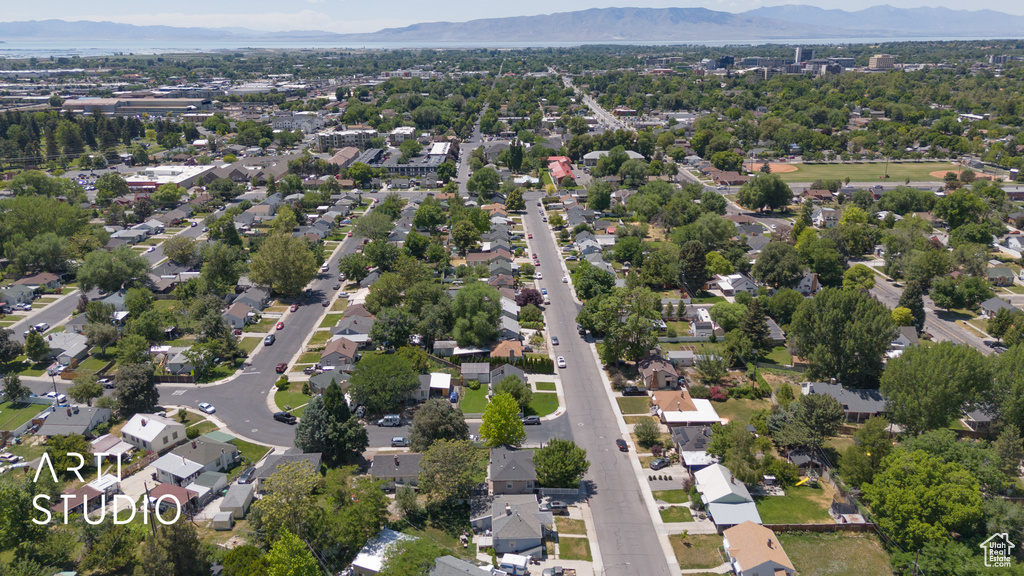View of property location with a mountain backdrop and nearby suburban area