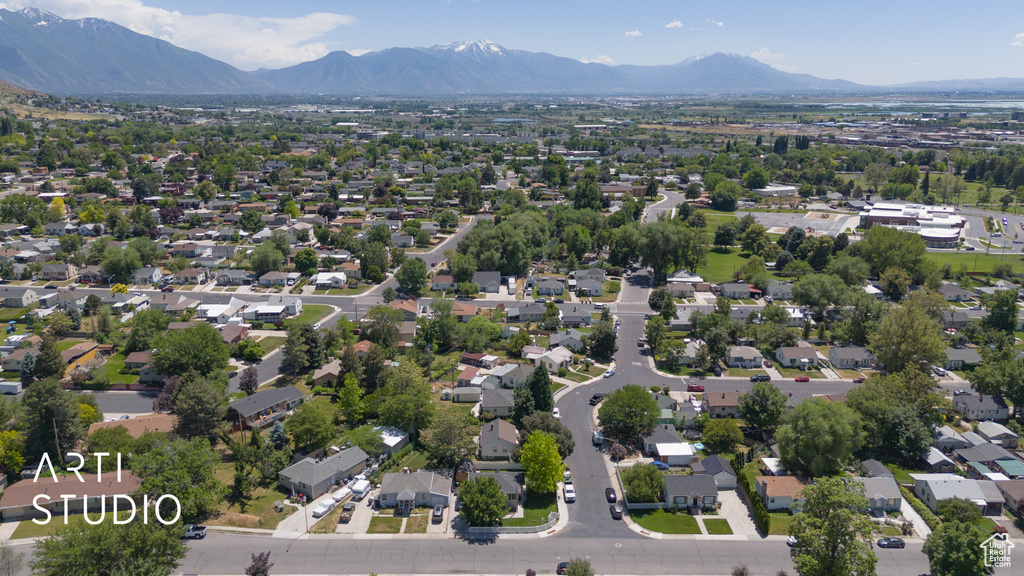 View of property location with a mountainous background and nearby suburban area