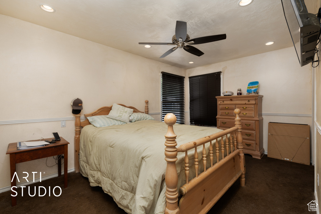 Bedroom with carpet flooring, recessed lighting, baseboards, and a ceiling fan