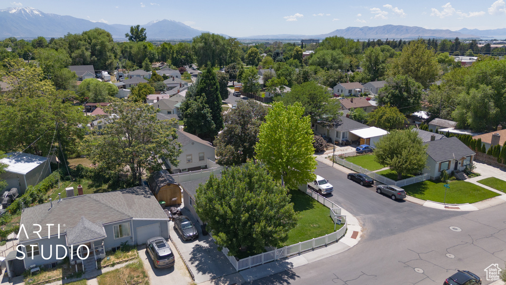 Aerial view of residential area with a mountain backdrop