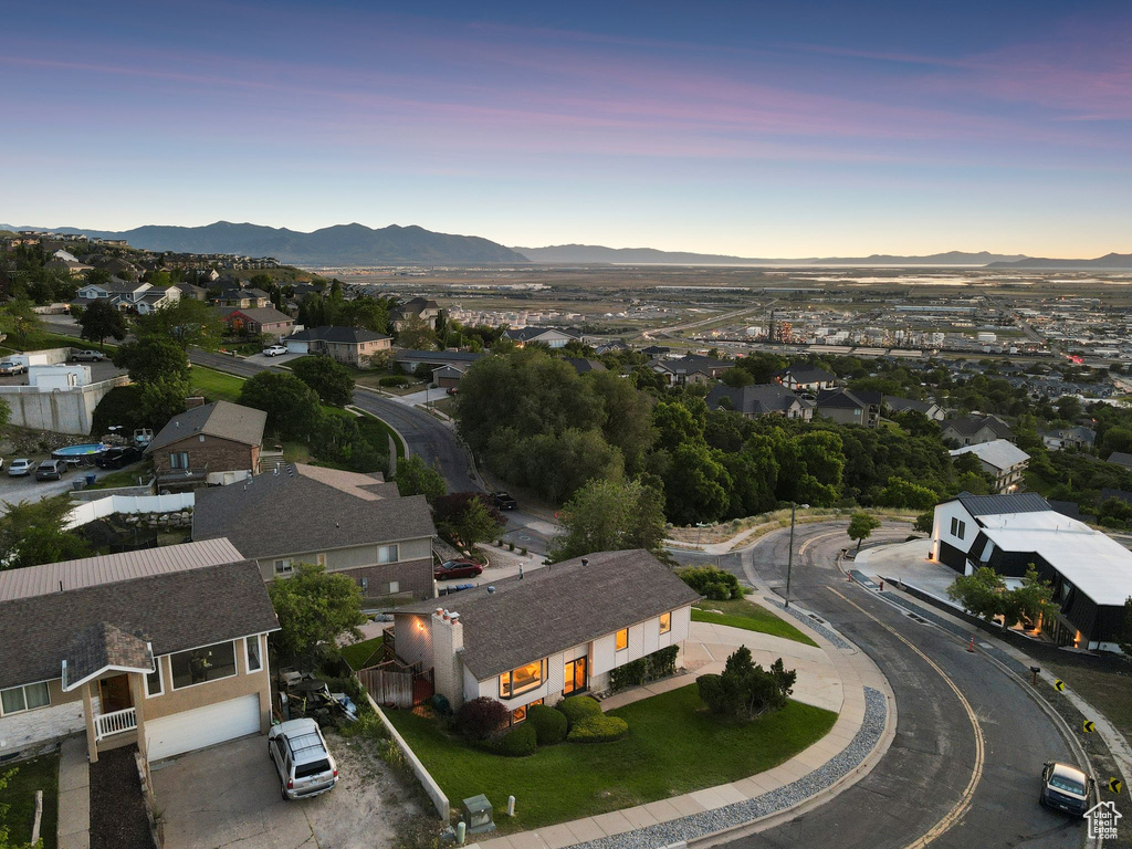 Aerial view at dusk of a mountain view and a residential view