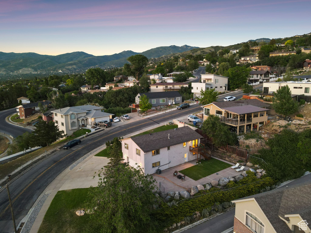 Aerial view at dusk of a mountain view and a residential view