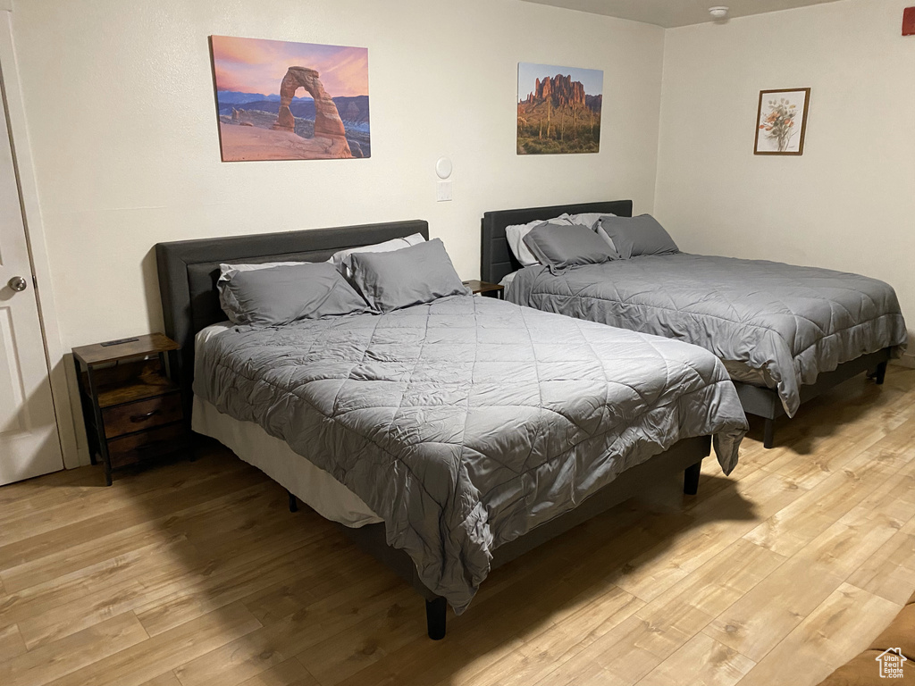 Bedroom featuring wood finished floors