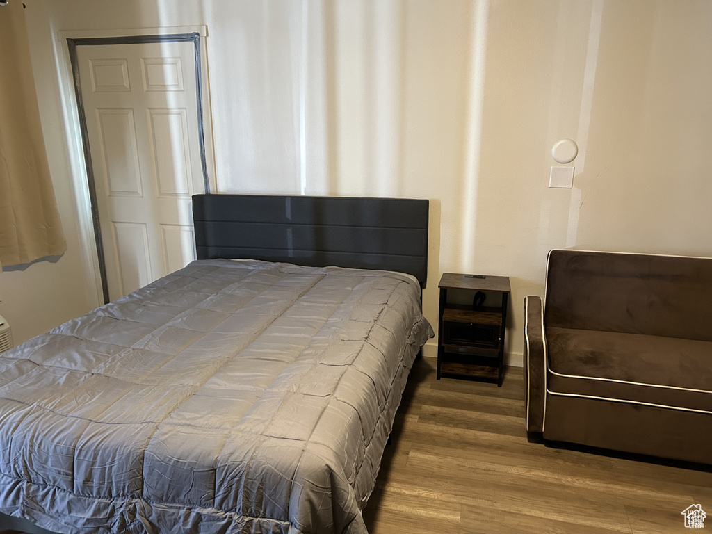 Bedroom featuring wood finished floors