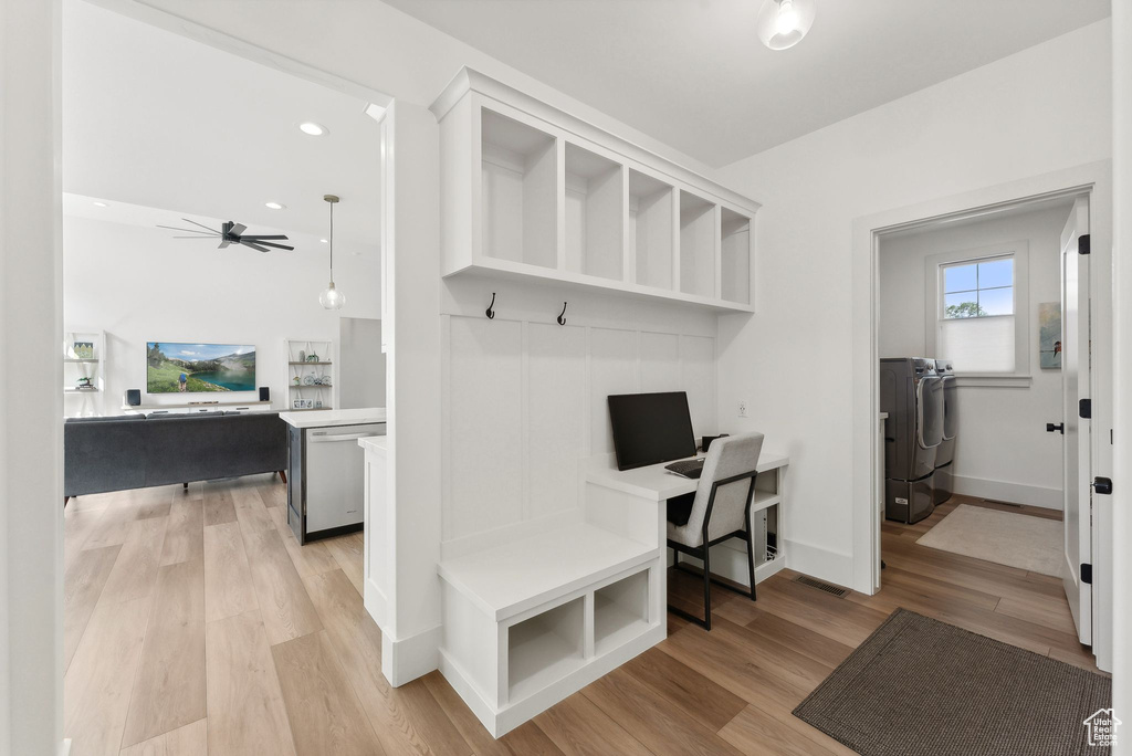 Mudroom featuring washing machine and dryer, light wood-style flooring, ceiling fan, baseboards, and recessed lighting