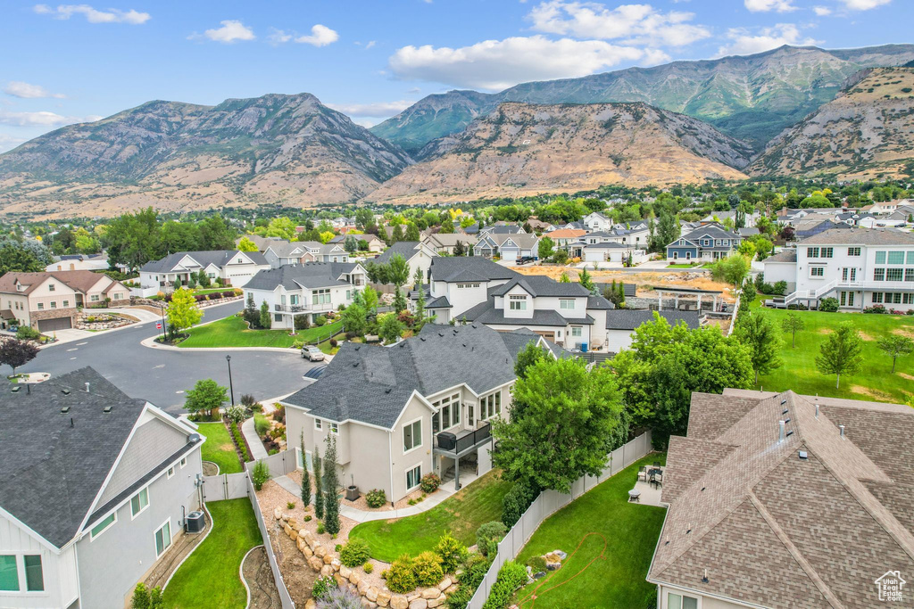 View of mountain backdrop with nearby suburban area