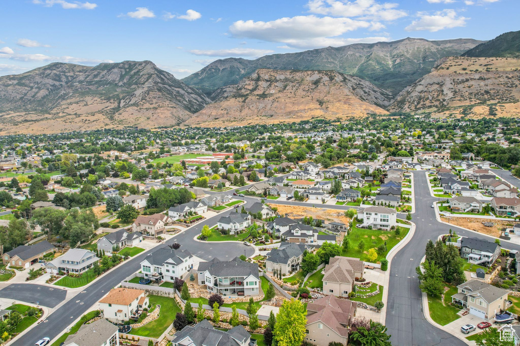 Aerial view of property\\\'s location featuring nearby suburban area and mountains