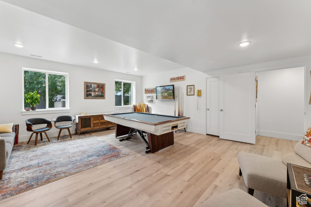Recreation room with light wood-type flooring, pool table, recessed lighting, and baseboards