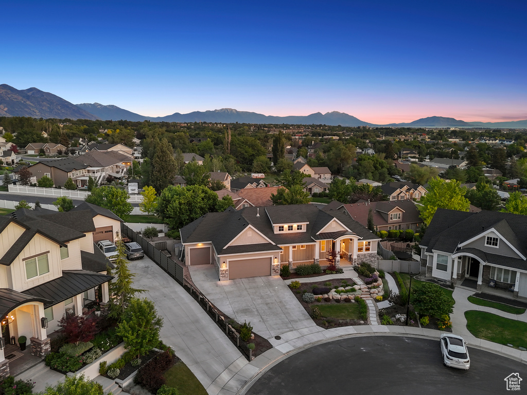 Aerial view at dusk of a mountain view and a residential view