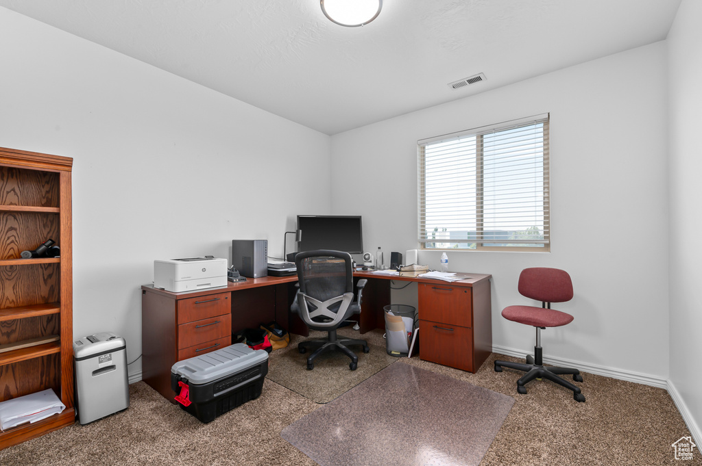 Office featuring carpet floors and baseboards