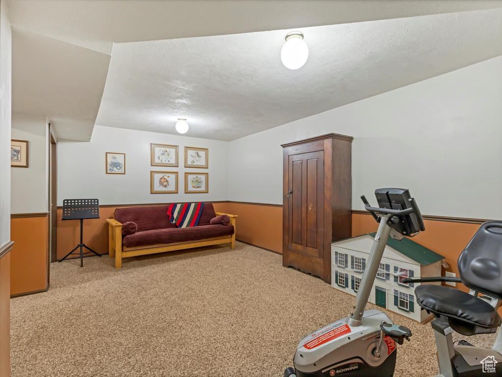 Exercise room with carpet floors
