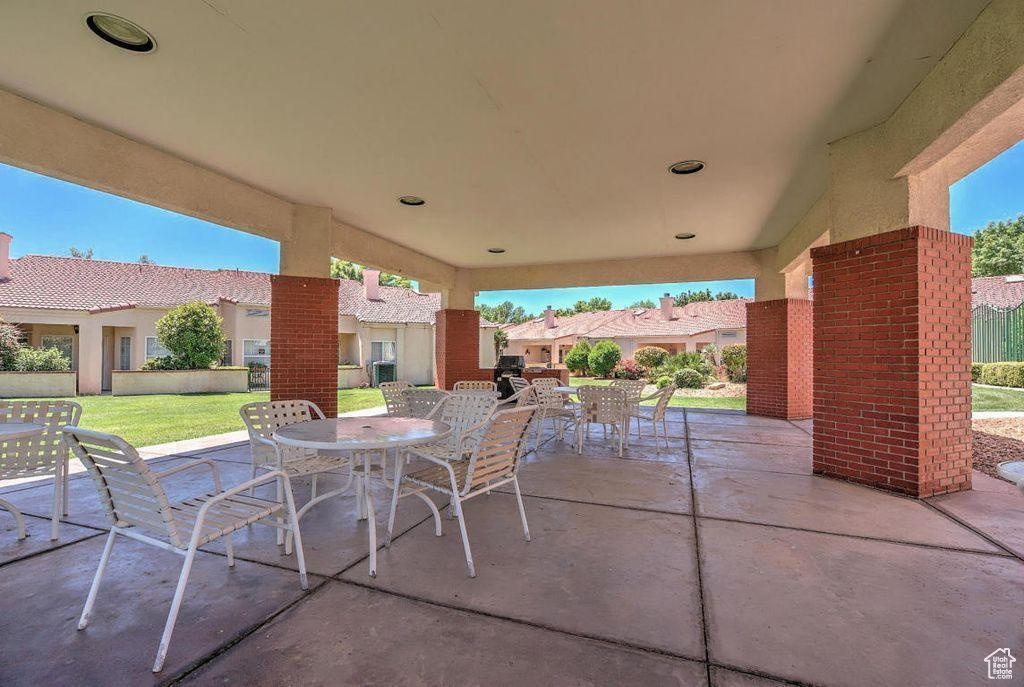 View of patio with outdoor dining area