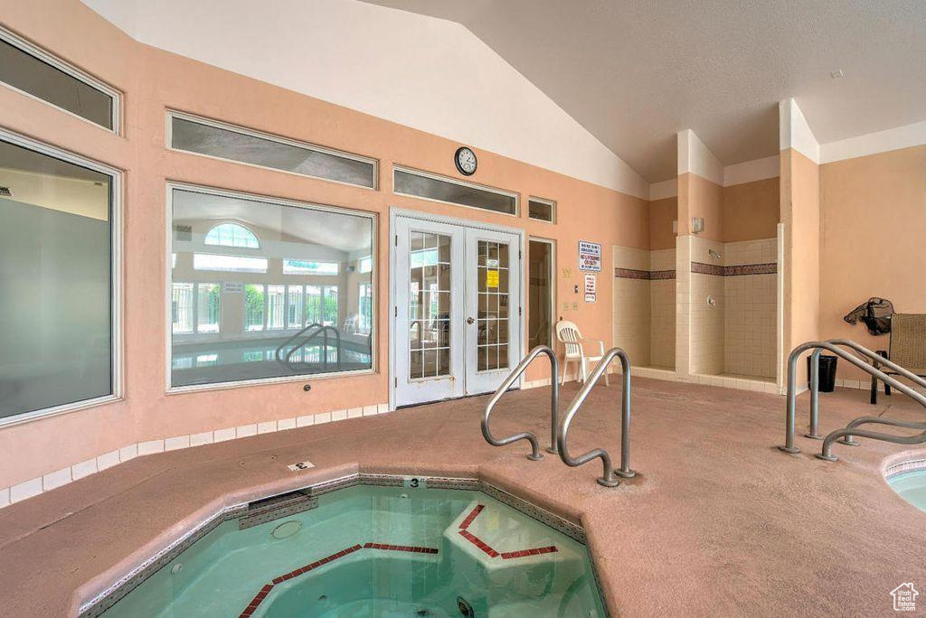 View of pool featuring french doors
