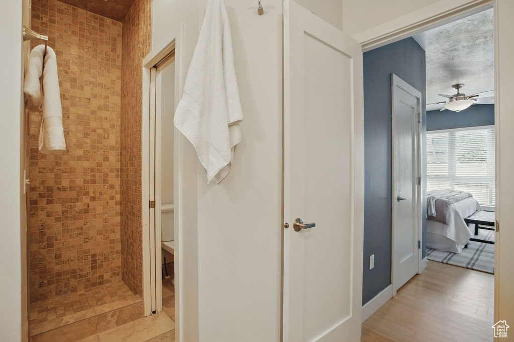Hall featuring light wood-type flooring