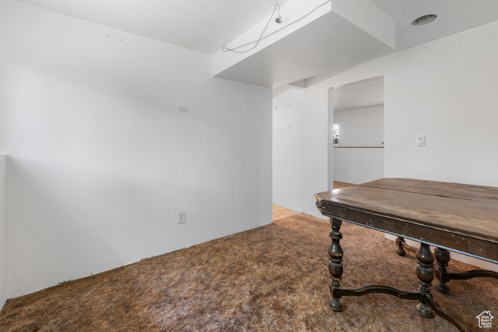 Home office featuring carpet