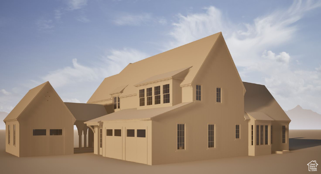 View of front facade with stucco siding, a garage, and concrete driveway