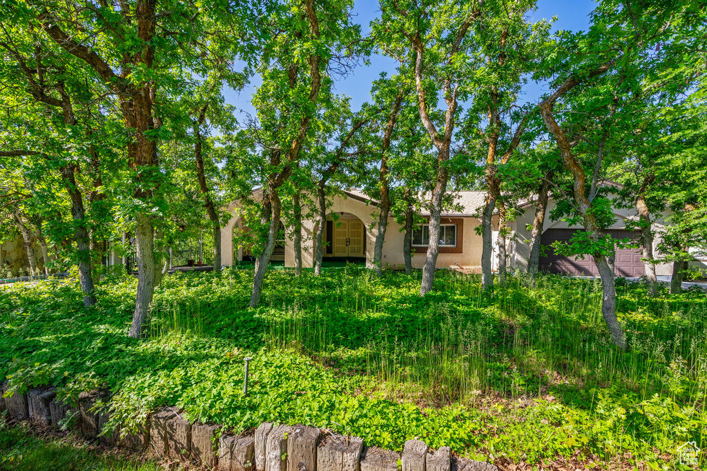 View of front of home with stucco siding