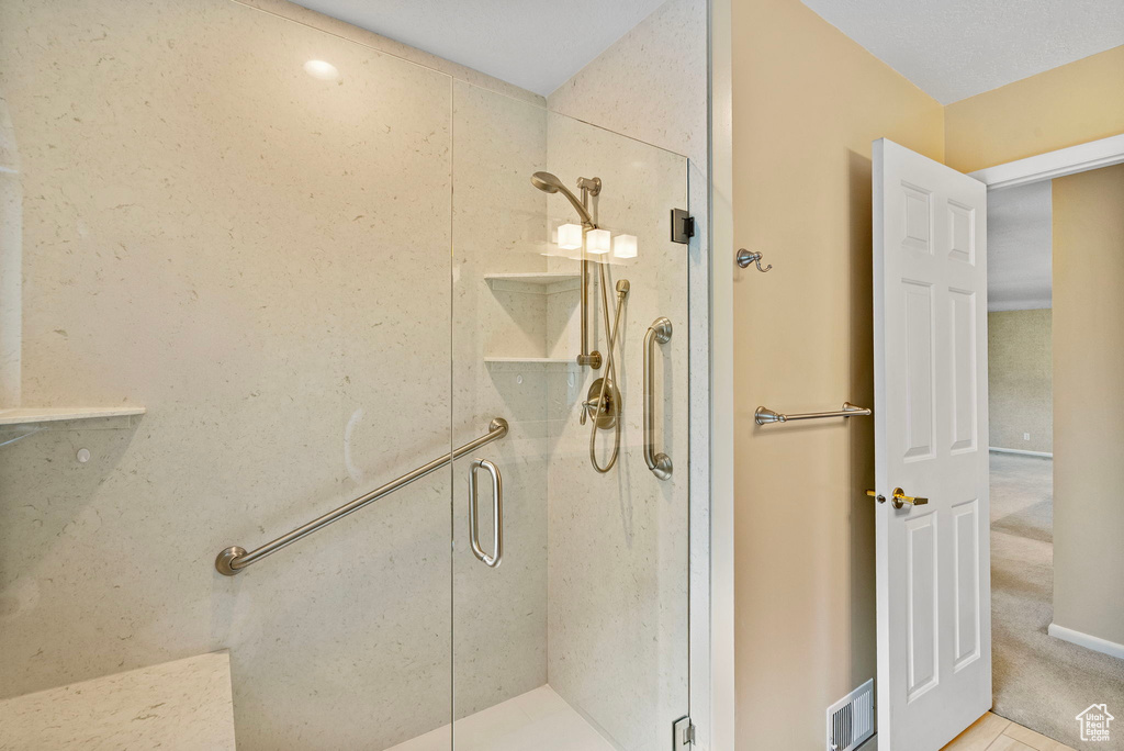 Bathroom with a shower stall
