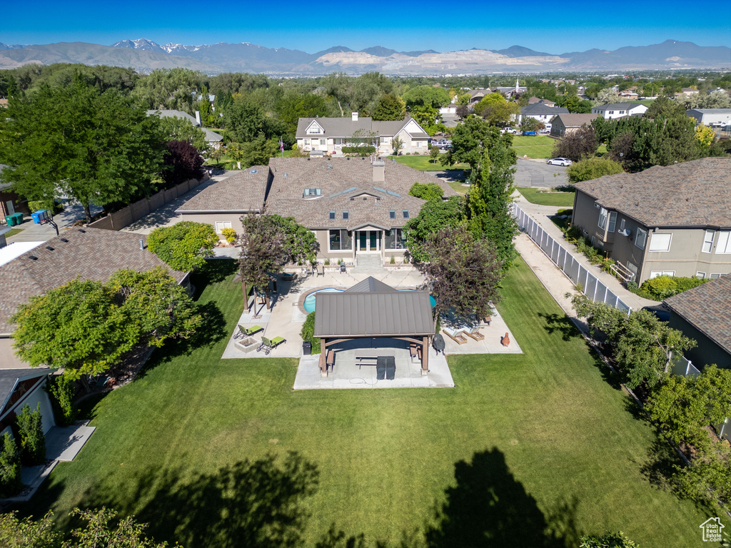 Aerial view of residential area with mountains