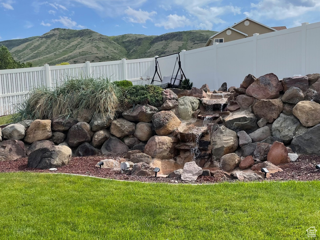 View of yard with a mountain view