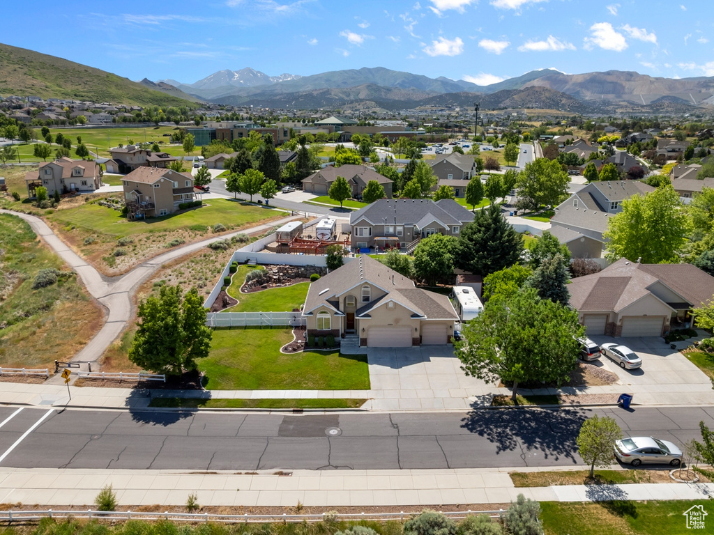 Aerial view of residential area with mountains