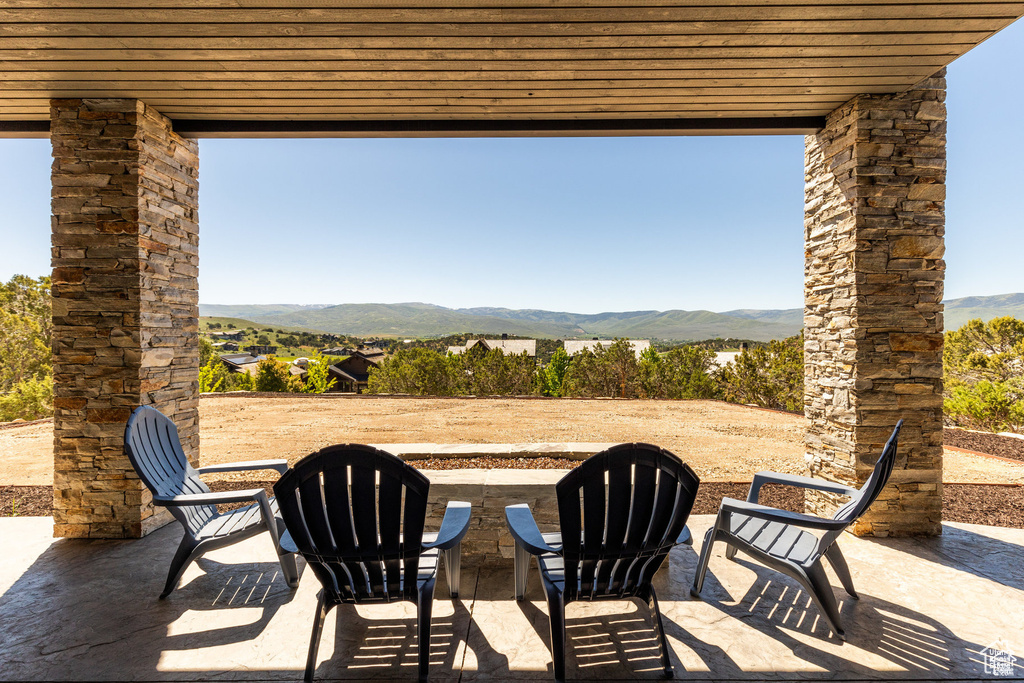 View of patio featuring a mountain view
