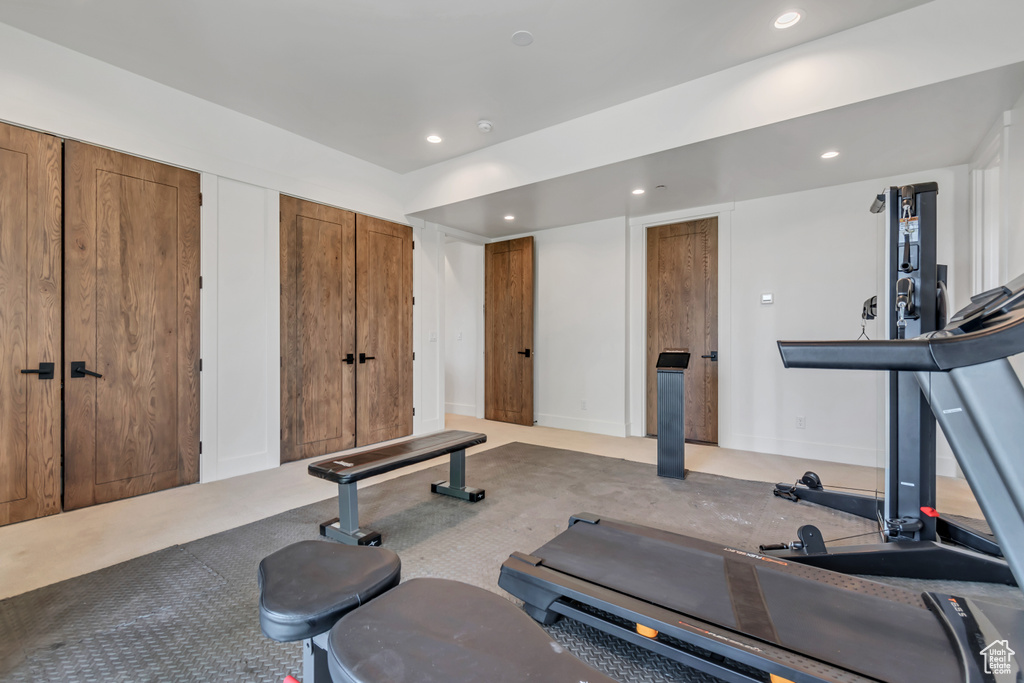 Workout area featuring carpet and recessed lighting